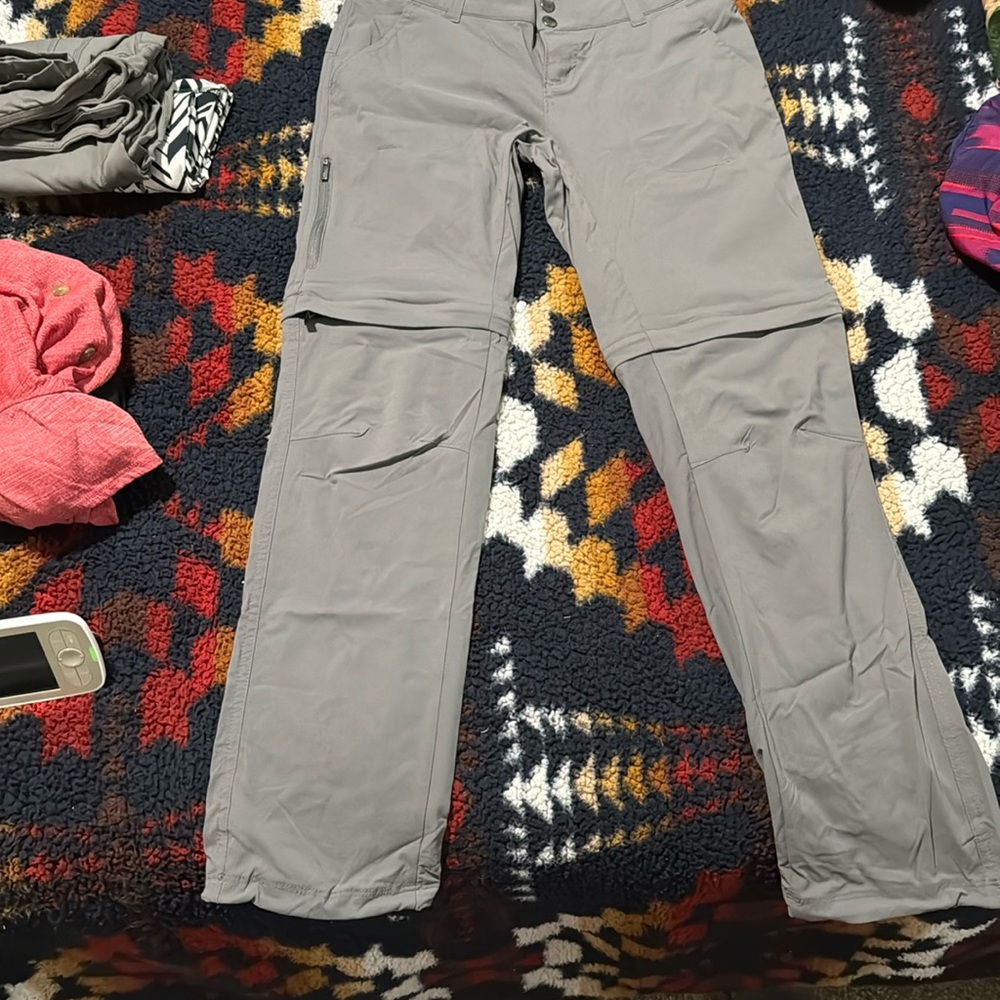 Hiking pants with zip off legs. Worn once. No stains or issues.